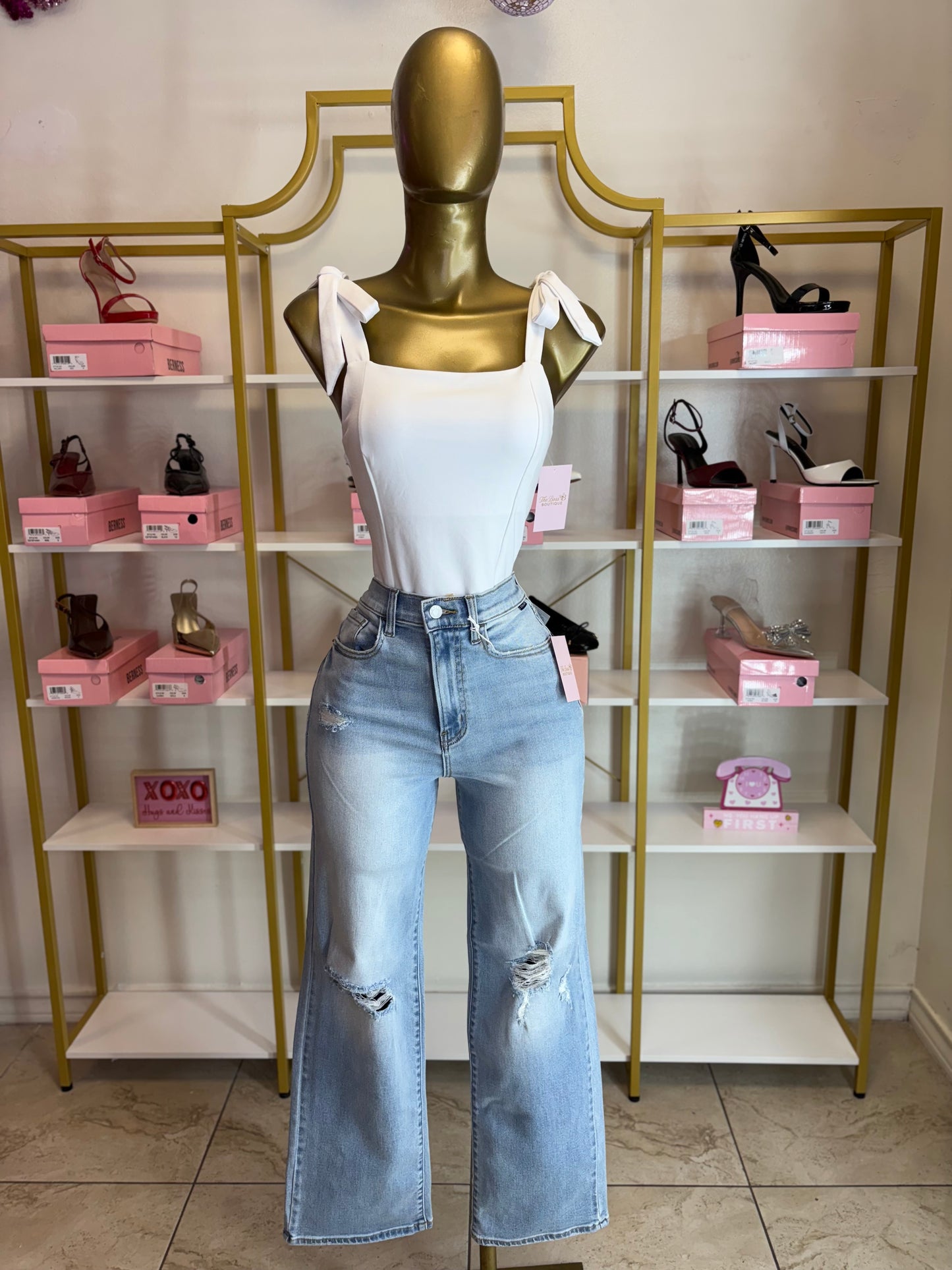 Light wash distressed straight jeans